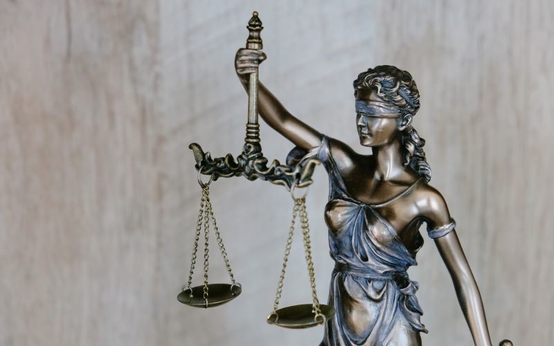 Themis as the personification of natural law, order, and justice